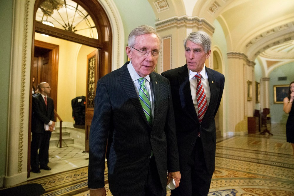 Sens. Harry Reid (D-Nev.) and Mark Udall (D-Colo) on Capitol Hill in Washington