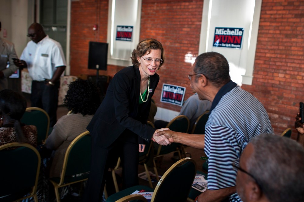 Michelle Nunn, the Democratic candidate for Senate in Georgia, greets supporters at a campaign event in Waycross, Ga., Aug. 13, 2014. (Photo by Stephen Morton/The New York Times/Redux)