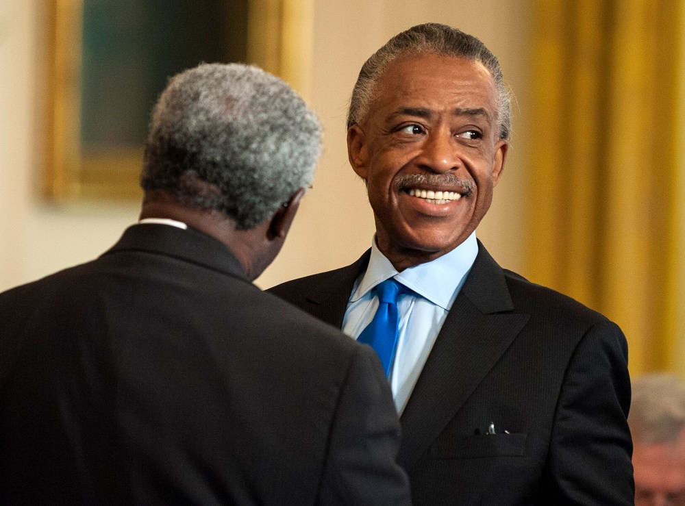 Rev. Al Sharpton (R) greets another participant during an Easter Prayer Breakfast at the White House in Washington DC, USA, 04 April 2012.