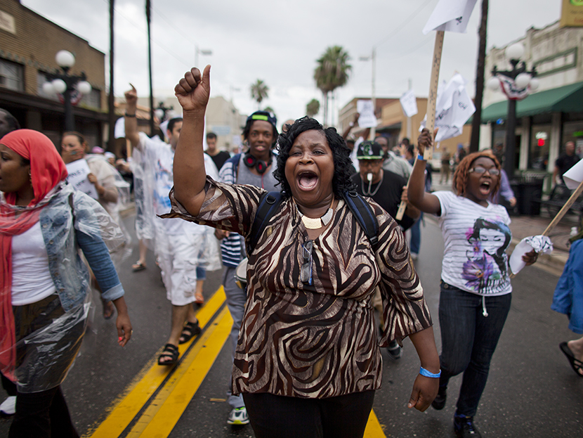 Protestors against voter suppression march on what was supposed to be the opening day of the Republican National Convention in Ybor City, Florida, on August 27, 2012. (Photo by Jim Lo Scalzo/EPA)