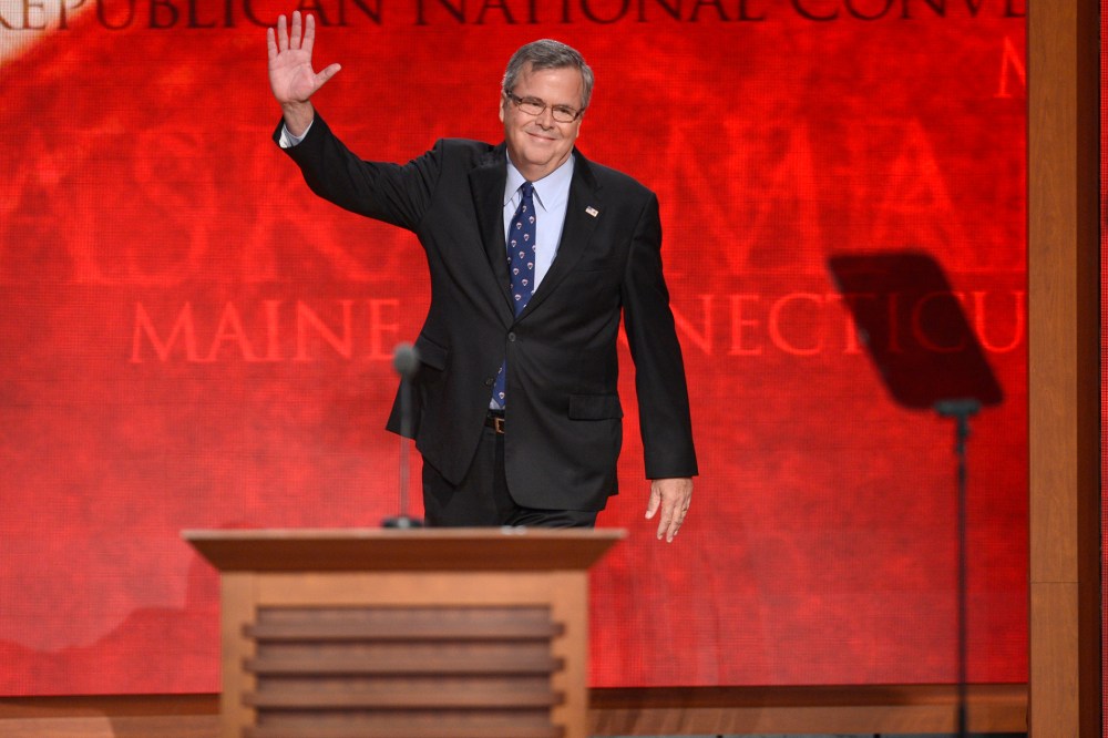 Former Republican Governor of Florida Jeb Bush waves to delegates as he takes the stage at the Republican National Convention at the Tampa Bay Times Forum in Tampa, Fla on Aug. 30, 2012.
