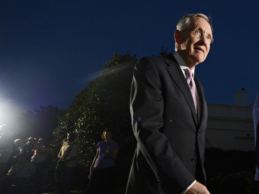 US Senate Majority Leader Harry Reid walks away after delivering remarks to members of the media, October 2, 2013.