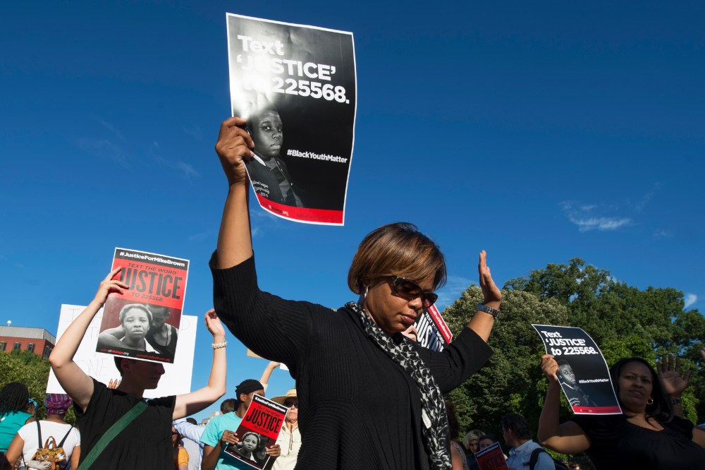 Missouri State Sen. Jamilah Nasheed marches in support of Michael Brown