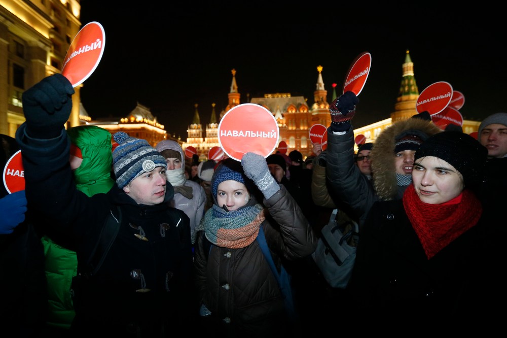 Supporters of opposition leader and anti-corruption blogger Alexei Navalny attend in rally in center of Moscow, Russia on Dec. 30, 2014. (YURI KOCHETKOV/EPA)