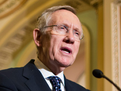 Senate Majority Leader Harry Reid speaks with reporters following a Democratic strategy session at the Capitol in Washington on Jan. 22, 2013. (File photo by J. Scott Applewhite/AP)