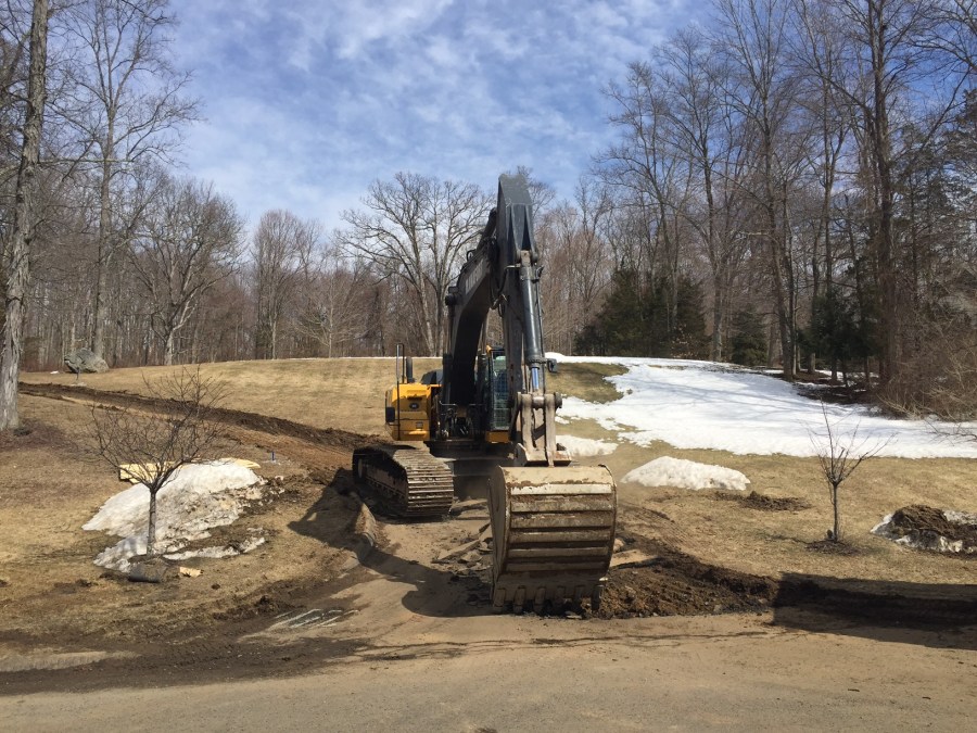 Construction equipment outside of where the Lanza home sat on March 24, 2015.
