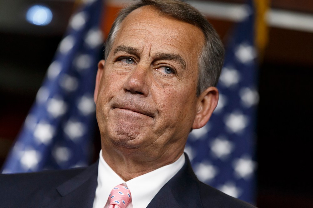 Speaker of the House John Boehner, R-Ohio, talks with reporters on Capitol Hill in Washington, Thursday, July 24, 2014.