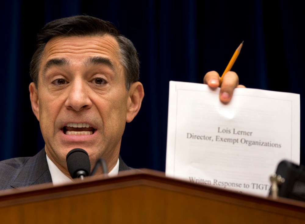 House Oversight Committee Chairman Rep. Darrell Issa, R-Calif. holds up a document on Capitol Hill in Washington, Wednesday, May 22, 2013.