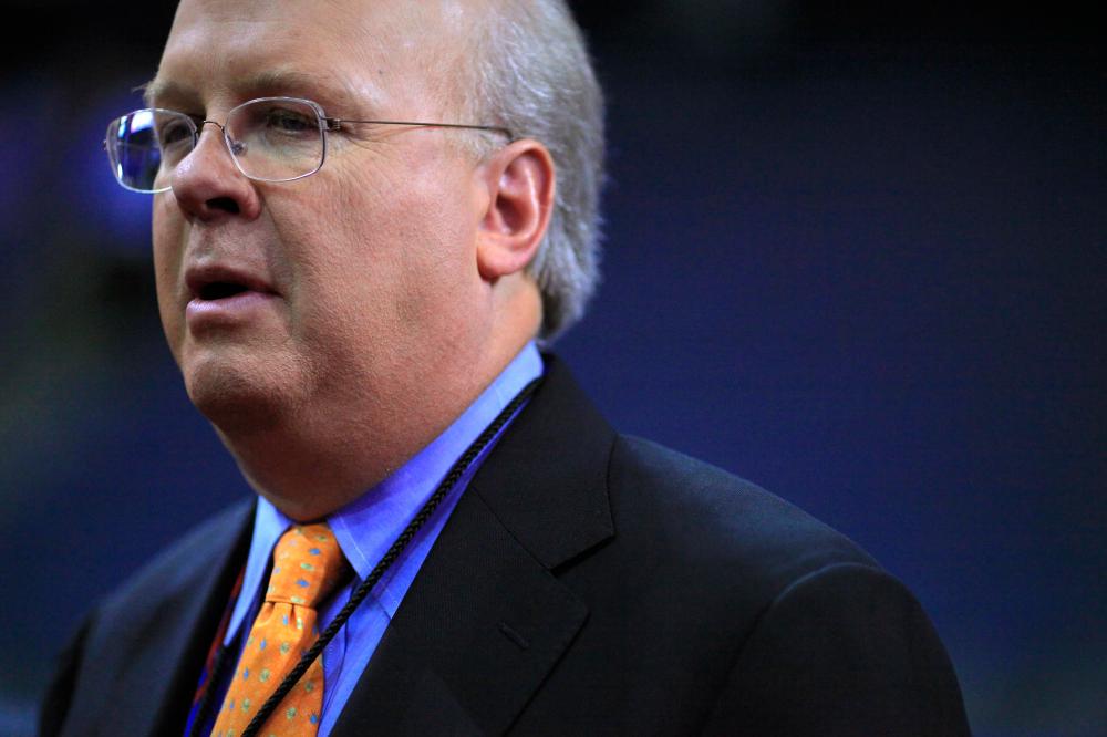 Karl Rove's PACs spent an estimated $127 million on ads supporting Mitt Romney. (Photo by Eric Thayer/REUTERS)