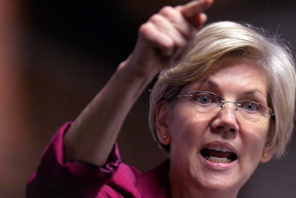 Massachusetts Senator Elizabeth Warren speaks to a rally of supporters of Kentucky senatorial candidate Alison Lundergan Grimes in Louisville, Ky., on Oct. 28, 2014. (Timothy D. Easley/AP)