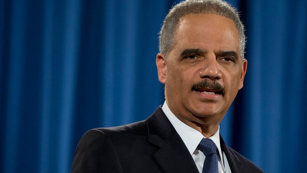 Attorney General Eric Holder speaks at the Justice Department in Washington, on March 4, 2015. (Photo by Carolyn Kaster/AP)
