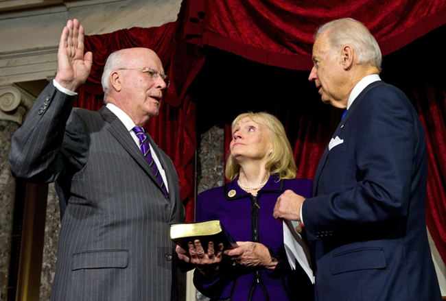 US Vice President Joe Biden(R) administers the oath of office to US Senator Patrick Leahy(L),D-VT, to be president pro tempore of the Senate as his wife Marcelle holds the Bible on December 18, 2012 AFP PHOTO/Karen BLEIERKAREN BLEIER/AFP/Getty Images