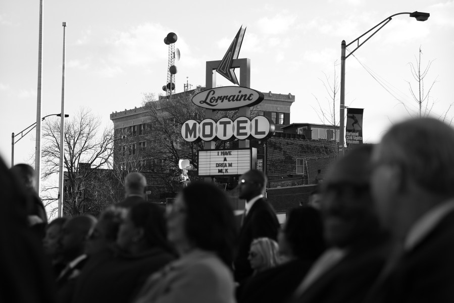 People gather outside the National Civil Rights museum to commemorate the 46th anniversary of the assassination of Dr. Martin Luther King Jr. and to mark the reopening of the museum, which underwent an 18-month, $28 million reconstruction project, April 4