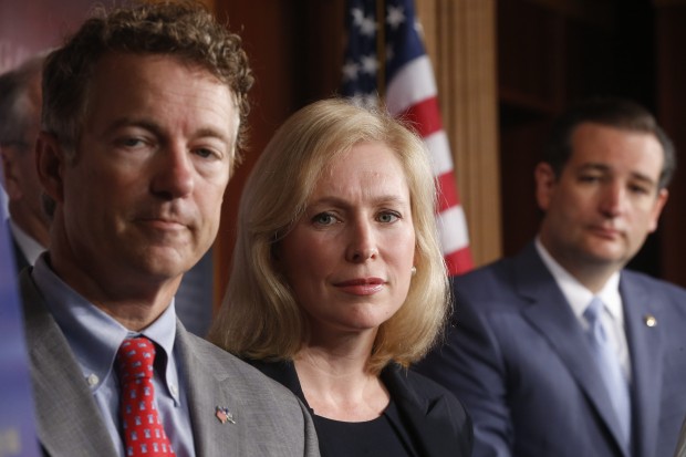 Sen. Kirsten Gillibrand, D-N.Y., Sen. Rand Paul, R-Ky., and Sen. Ted Cruz, R-Texas speak to reporters during a news conference about a bill regarding military sexual assault cases on Capitol Hill in Washington, Tuesday, July 16, 2013. (AP Photo/Charles...