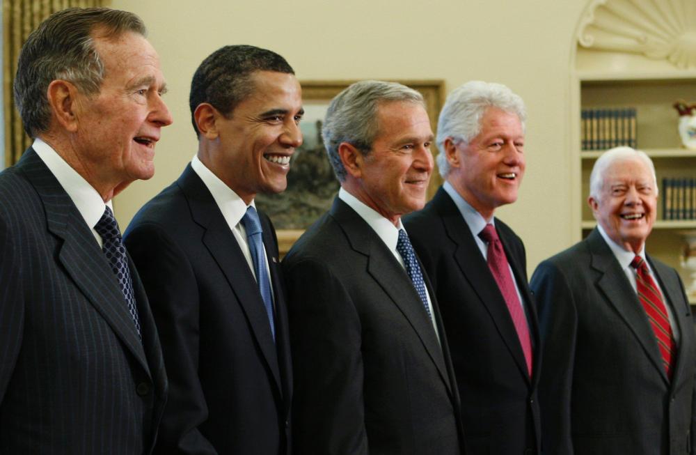 President-elect Barack Obama is welcomed by President George W. Bush for a meeting at the White House in Washington, Wednesday, Jan. 7, 2009, with former presidents, from left, George H.W. Bush, Bill Clinton and Jimmy Carter.