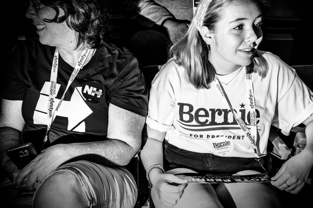 Supporters of rival democratic presidential candidates discuss their excitement before the start of the New Hampshire Democratic Convention in Manchester, N.H., Sept. 19, 2015. (Photo by Mark Peterson for MSNBC)