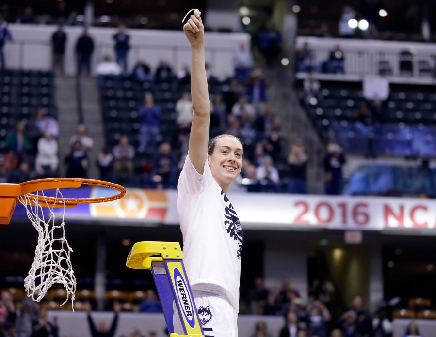 Connecticut's Breanna Stewart (30) celebrates by cutting down the net after Connecticut's 82-51 victory over Syracuse in the championship game at the women's Final Four in the NCAA college basketball tournament, April 5, 2016, in Indianapolis.