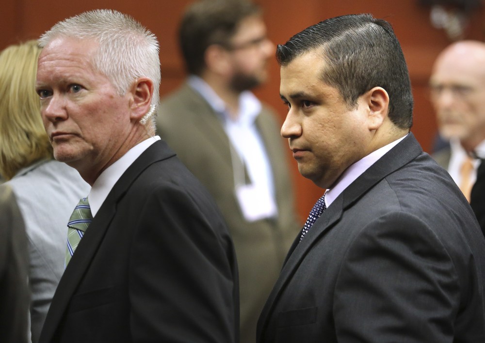 George Zimmerman, right, leaves court after Zimmerman's not guilty verdict was read in Seminole Circuit Court in Sanford, Fla. on Saturday, July 13, 2013. Jurors found Zimmerman not guilty of second-degree murder in the fatal shooting of 17-year-old...