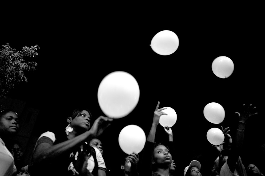 Community organizers commemorate the one-year anniversary of the death of Damian Turner.