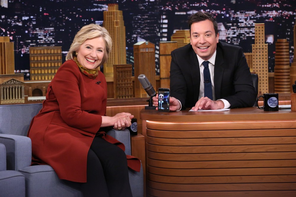 Presidential candidate Hillary Clinton shares a laugh with Jimmy Fallon as they take a Snapchat on Tonight Show, Jan. 14, 2016. (Photo by Douglas Gorenstein/NBC)