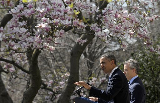 President Barack Obama, accompanied by acting Budget Director Jeffrey Zients, speaks in the Rose Garden of the White House in Washington, Wednesday April 10, 2013, to discuss his proposes fiscal 2014 federal budget.  (AP Photo/Susan Walsh)