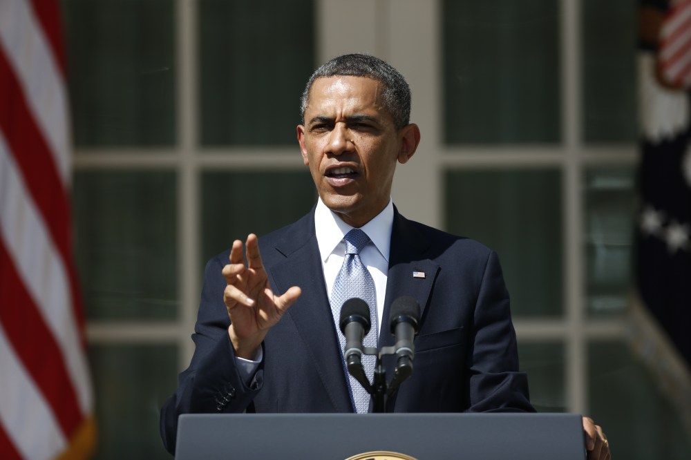 President Barack Obama speaks about his proposed 2014 budget as he stands with acting budget director Jeff Zients in the Rose Garden at the White House in Washington, Wednesday, April 10, 2013. (AP Photo/Charles Dharapak)