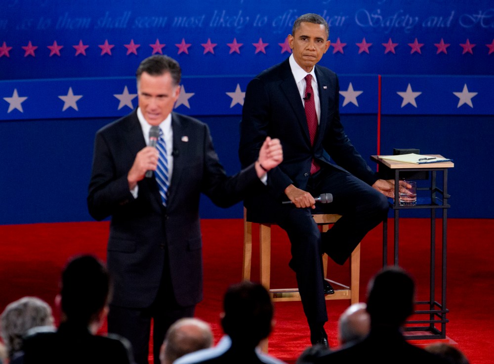 President Barack Obama and Republican presidential candidate, former Massachusetts Gov. Mitt Romney, participate in the presidential debate on Tuesday, Oct. 16, 2012, at Hofstra University in Hempstead, N.Y. (AP Photo/Carolyn Kaster)