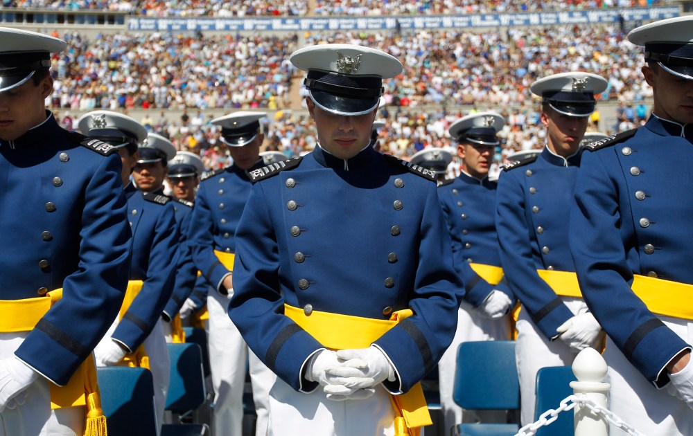 U.S. Air Force Academy Cadets of the Class of 2012, lower their heads during the Invocation at the start of the commencement ceremony, Wednesday, May 23, 2012, in Colorado Springs, Colo.