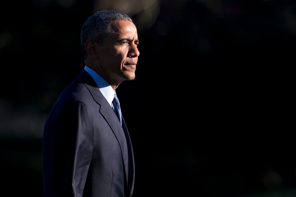 President Barack Obama walks across the South Lawn of the White House from Marine One, March 29, 2016, in Washington, D.C. (Photo by Carolyn Kaster/AP)