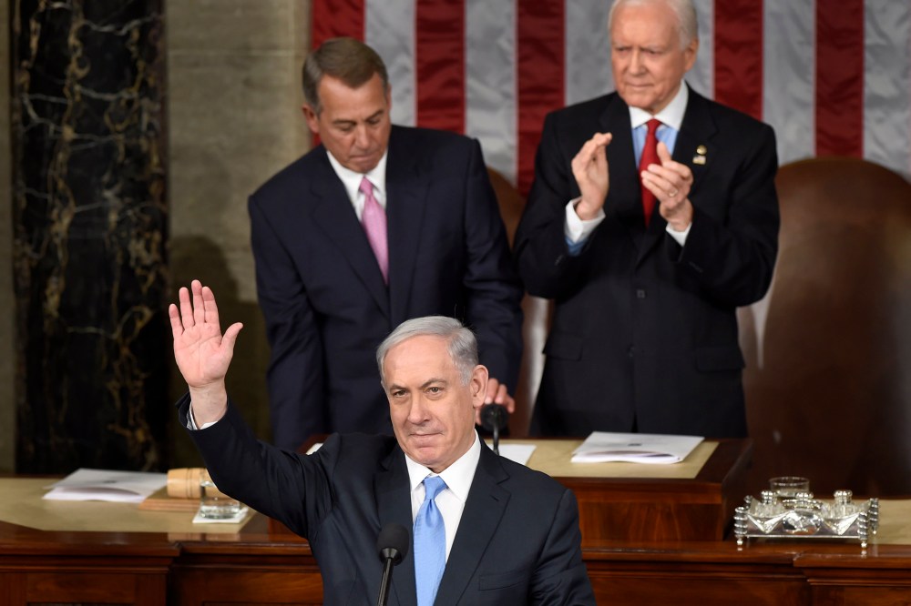 Israeli Prime Minister Benjamin Netanyahu waves as he speaks before a joint meeting of Congress on Capitol Hill in Washington on March 3, 2015. (Photo by Susan Walsh/AP)