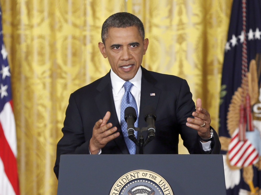 President Barack Obama speaks about the debt limit in the East Room of the White House in Washington, Monday, Jan. 14, 2013. (Photo by Carolyn Kaster/AP Photo)