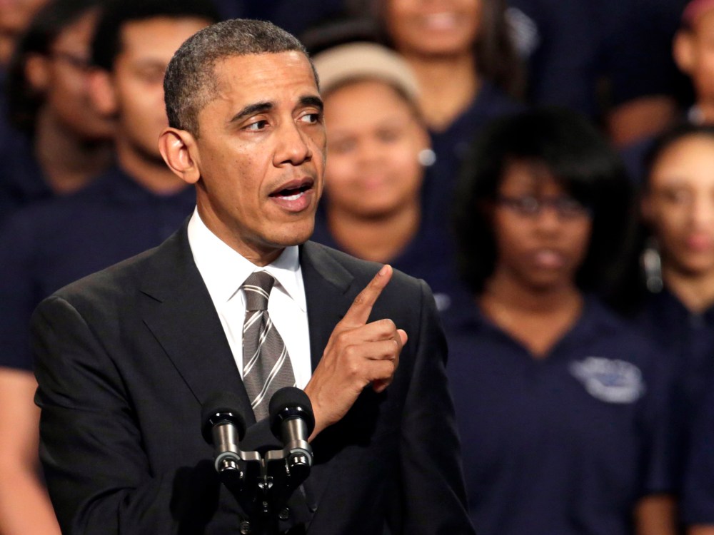 President Barack Obama speaks about strengthening the economy for the middle class and the nations struggle with gun violence at an appearance at Hyde Park Academy, Friday, Feb. 15, 2013, in Chicago.  (Photo by M. Spencer Green/AP Photo)
