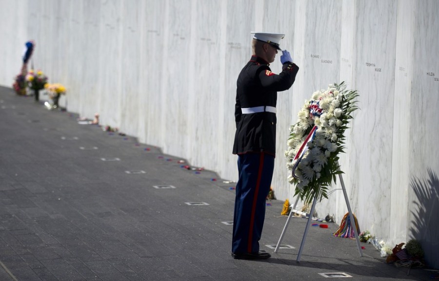 A Marine Honor Guard lays a wreath in front of the Wall of Names at the Flight 93 National Memorial during observances commemorating the eleventh anniversary of the 9/11 attacks, on Sept. 11, 2012 in Shanksville, Penn.