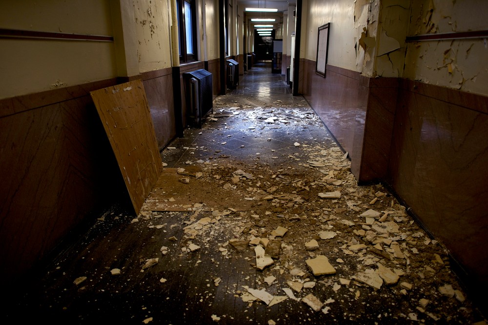 Debris litters the now vacant hallways of the George W. Childs School in Philadelphia, Jan. 31, 2014.