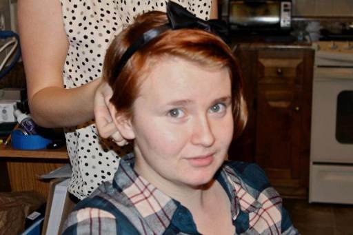 A woman is comforted by a man near a triage tent set up for the Boston Marathon after explosions went off at the 117th Boston Marathon in Boston, Massachusetts April 15, 2013.(Photo by Jessica Rinaldi/Reuters)