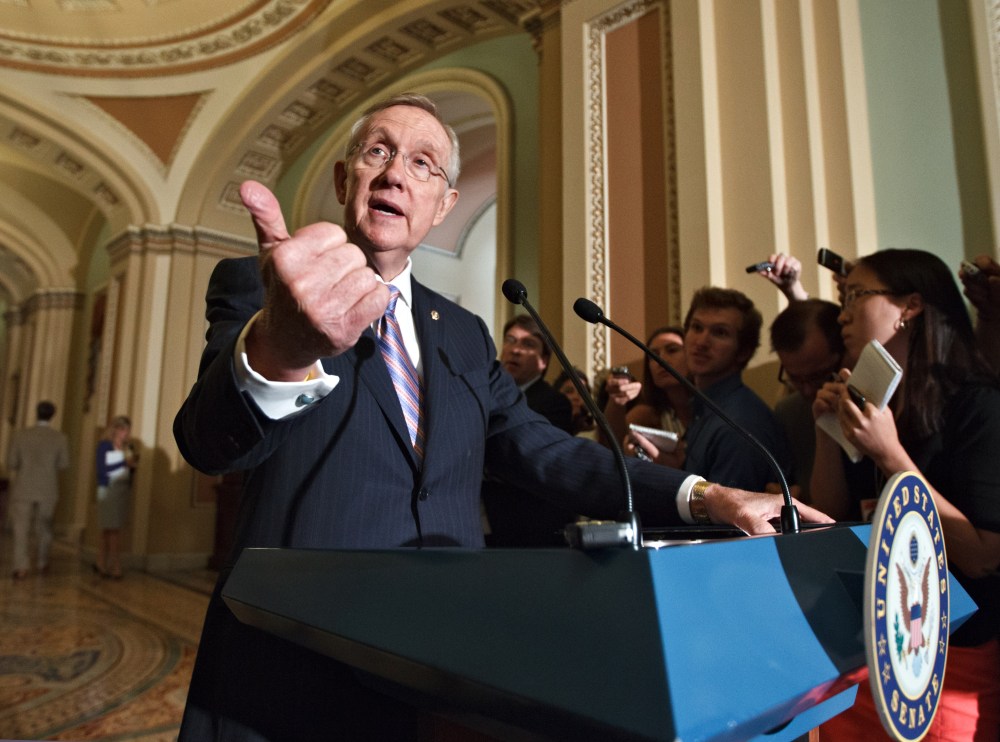 Senate Majority Leader Harry Reid of Nev. speaks to reporters on Capitol Hill in Washington, Tuesday, June 26, 2012, following the Democrats' weekly strategy session.  (AP Photo/J. Scott Applewhite)