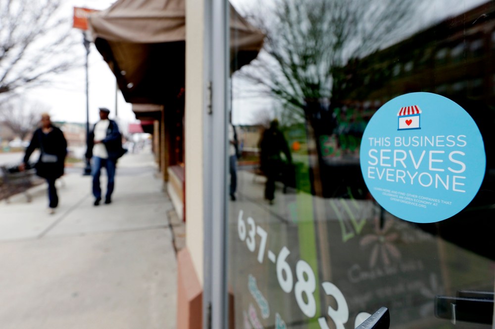 A window sticker on a downtown Indianapolis florist, on March 25, 2015, shows it's objection to the Religious Freedom bill passed by the Indiana legislature.