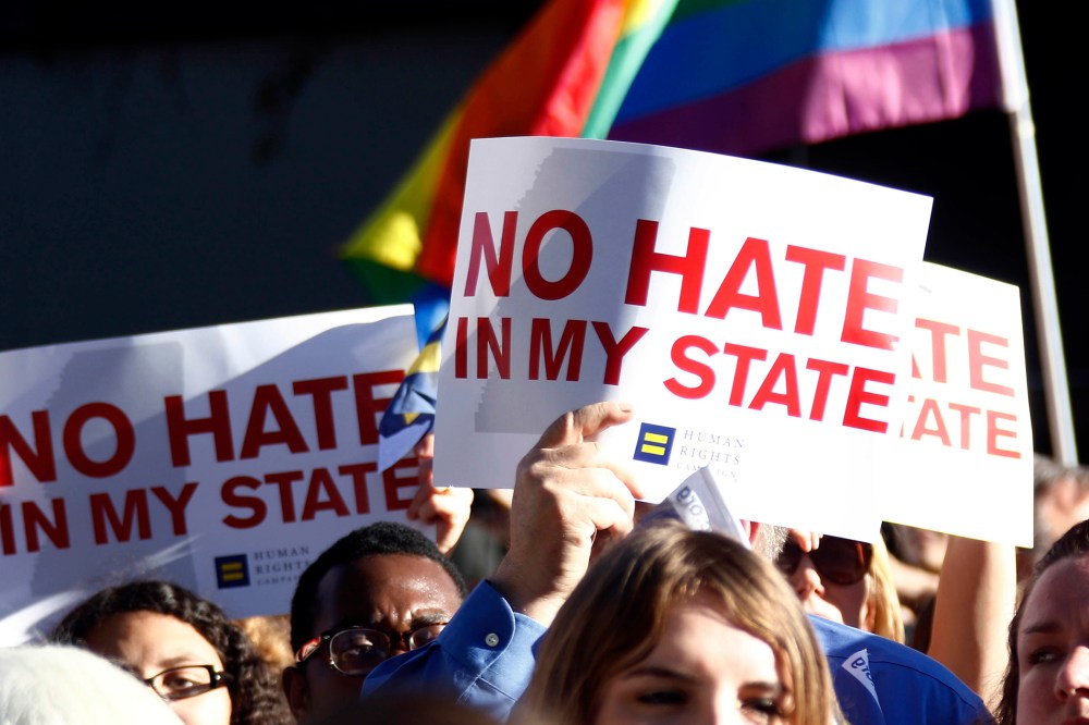 Protesters call for Mississippi Gov. Phil Bryant to veto House Bill 1523, which they says will allow discrimination against LGBT people, during a rally outside the Governor's Mansion in Jackson, Miss., April 4, 2016. (Photo by Rogelio V. Solis/AP)