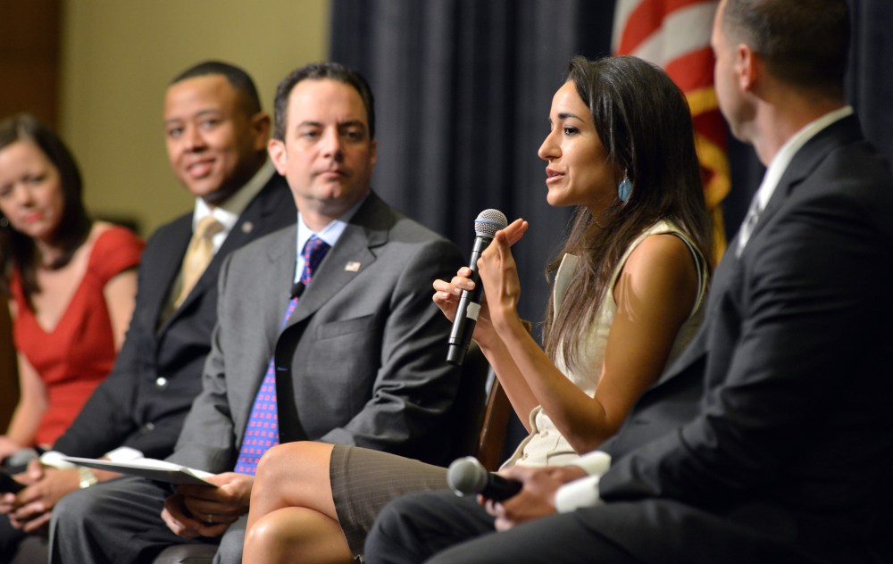 New Hampshire state Rep. Marilinda Garcia,  second from right, speaks as, from left, Karin Agness, founder of Network of Enlightened Women, Speaker of the House in Oklahoma, T.W. Shannon,  Chairman of the Republican National Committee Reince Priebus,...