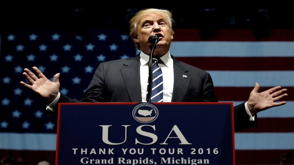 Image: U.S. President-elect Donald Trump speaks at a "Thank You USA" tour rally in Grand Rapids