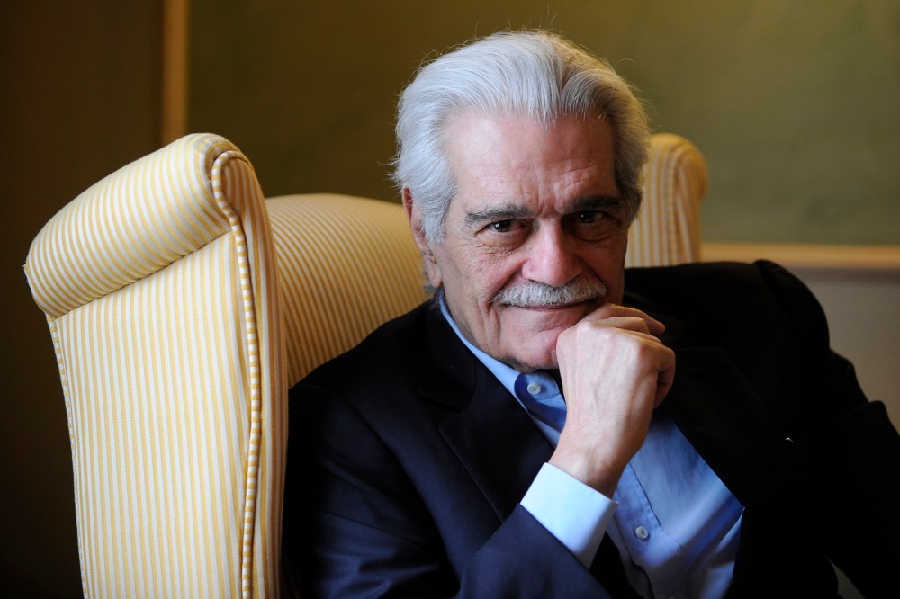 Egyptian actor Omar Sharif poses for a photograph at a hotel in Aviles, northern Spain