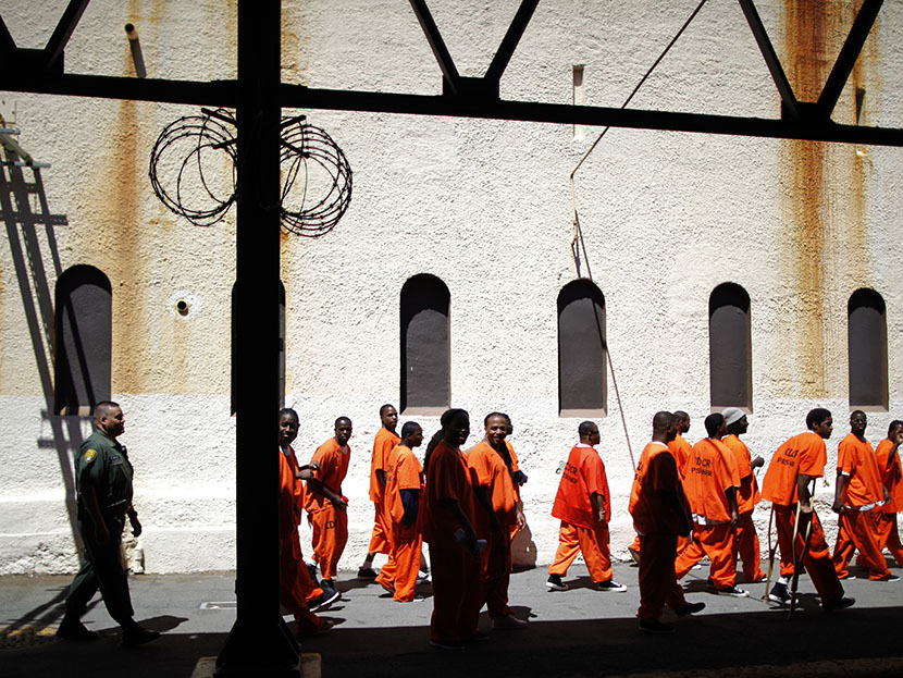 Inmates walk in San Quentin state prison in San Quentin, California June 8, 2012.  (Photo by Lucy Nicholson/Reuters)