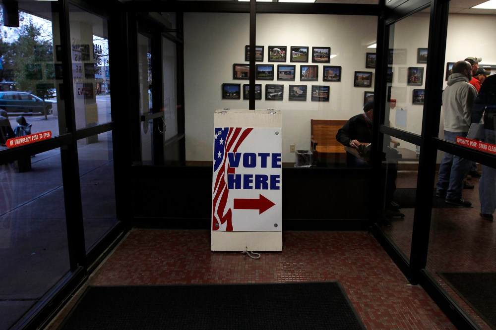 Signs direct voters to the Licking County Board of Elections to open in Newark, Ohio on Nov. 3, 2012. (Photo by Matt Sullivan/Reuters)