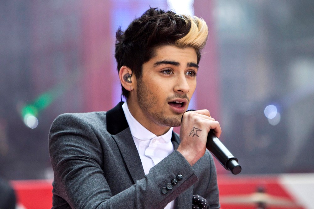 Zayn Malik performs with his band "One Direction" on NBC's Today show in New York on Nov. 13, 2012. (Photo by Andrew Burton/Reuters)