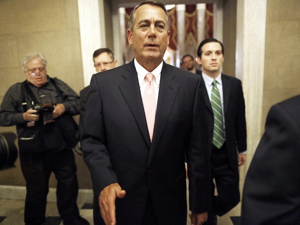 U.S. House Speaker John Boehner returns to his office at the U.S. Capitol in Washington, after the Republican-led U.S. House of Representatives approved another emergency funding bill