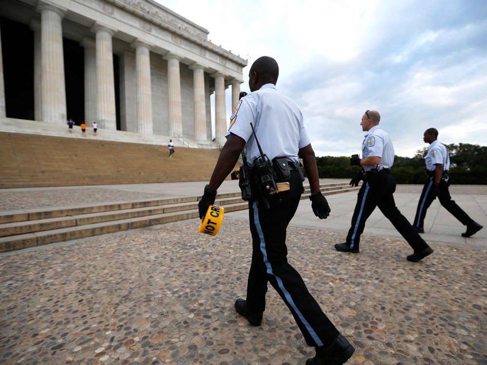 Nationals Parks police arrive with tape to seal off the Lincoln Memorial in Washington
