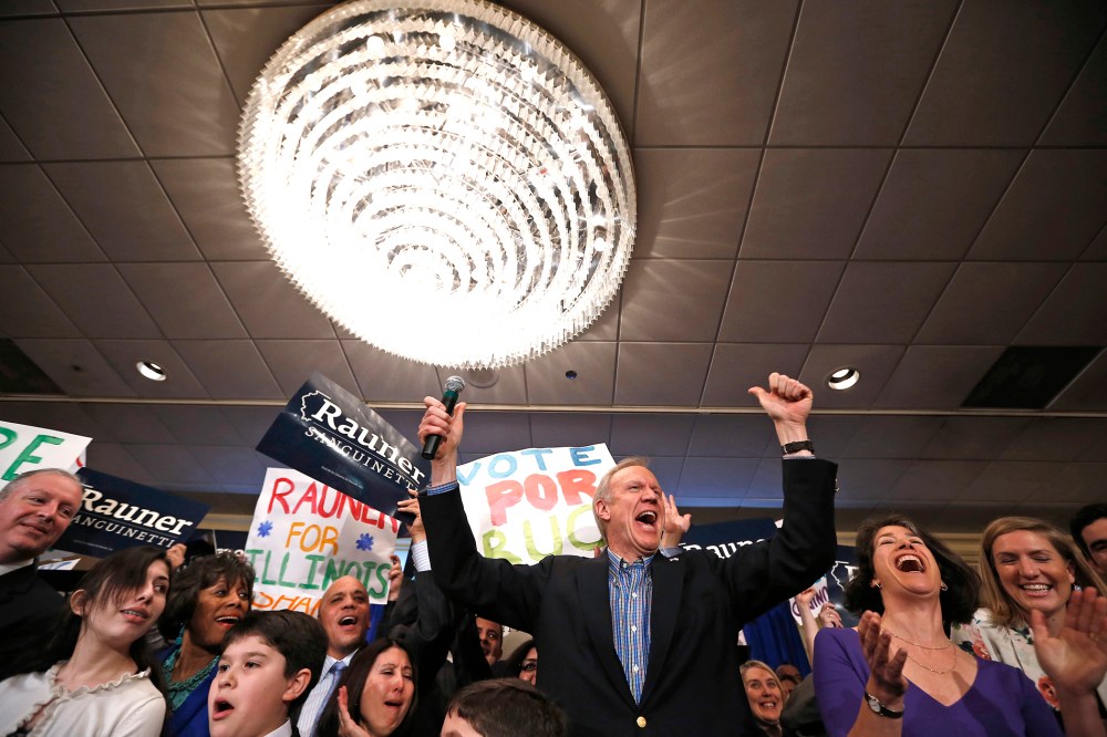 Republican candidate for Illinois Governor Bruce Rauner celebrates with supporters after winning the nomination in the Illinois Primary in Chicago, March 18, 2014.