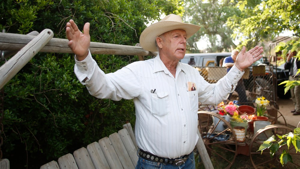 Rancher Cliven Bundy gestures at his home in Bunkerville, Nevada on April 12, 2014.