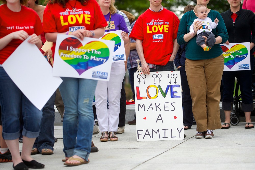 Gay rights supporters hold rally on Pennsylvania State Capital steps after ruling struck down ban on same-sex marriage in Harrisburg
