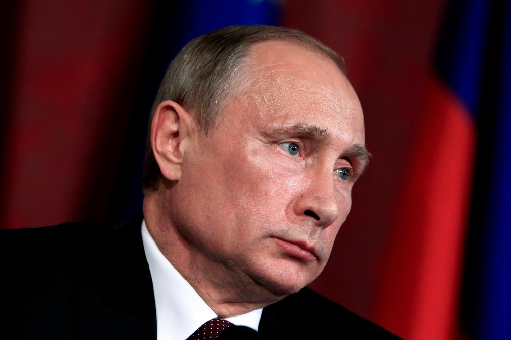Russia's President Vladimir Putin attends a news conference in Vienna, June 24, 2014.